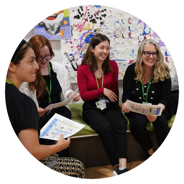 A group of adults in a meeting